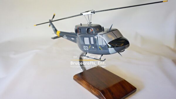 Model of UH-1N Twin Huey US NAVY 103 Aircraft with detailed craftsmanship.